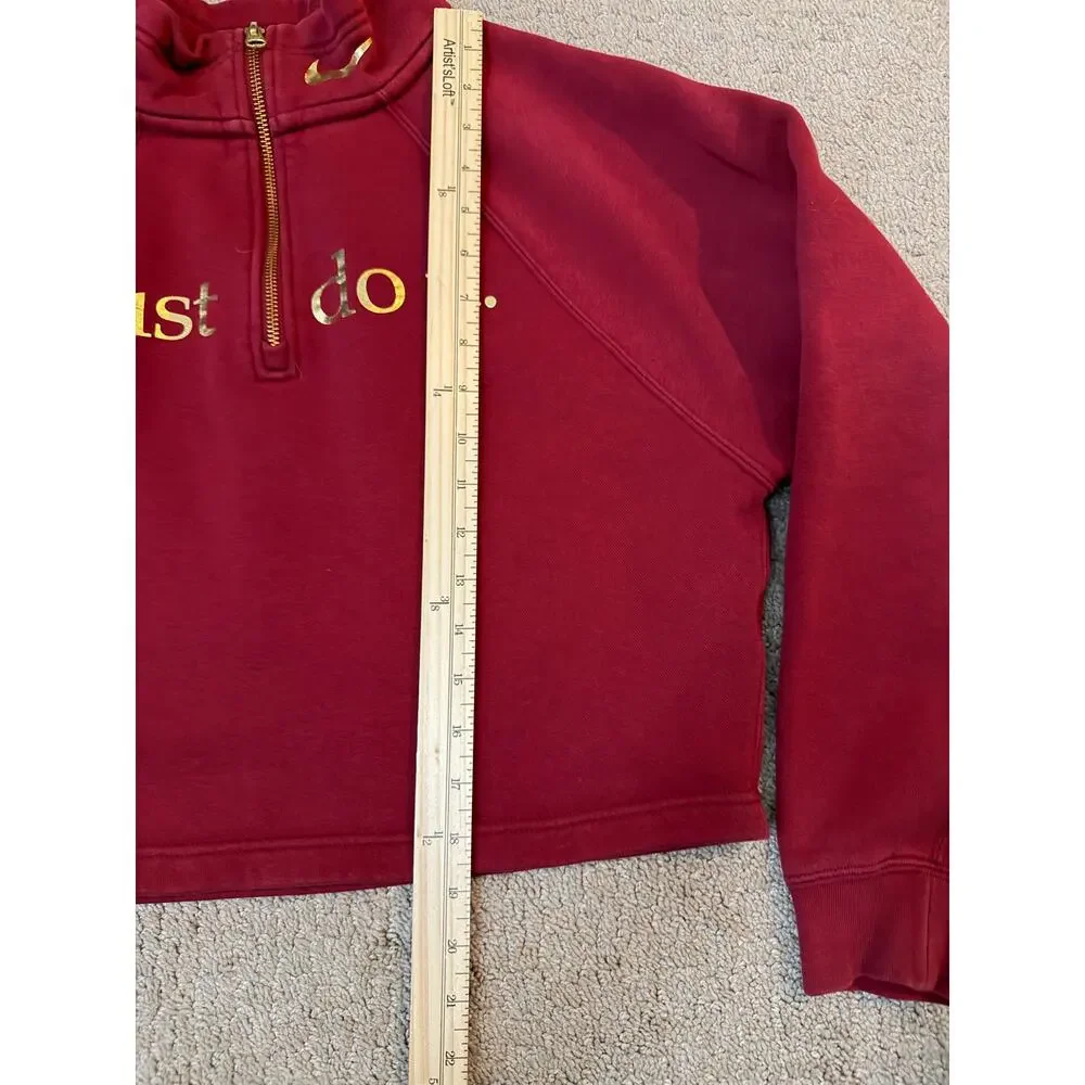 Nike Sportswear Shine Funnel-Neck 1/4 Zip cropped sweatshirt with gold accents